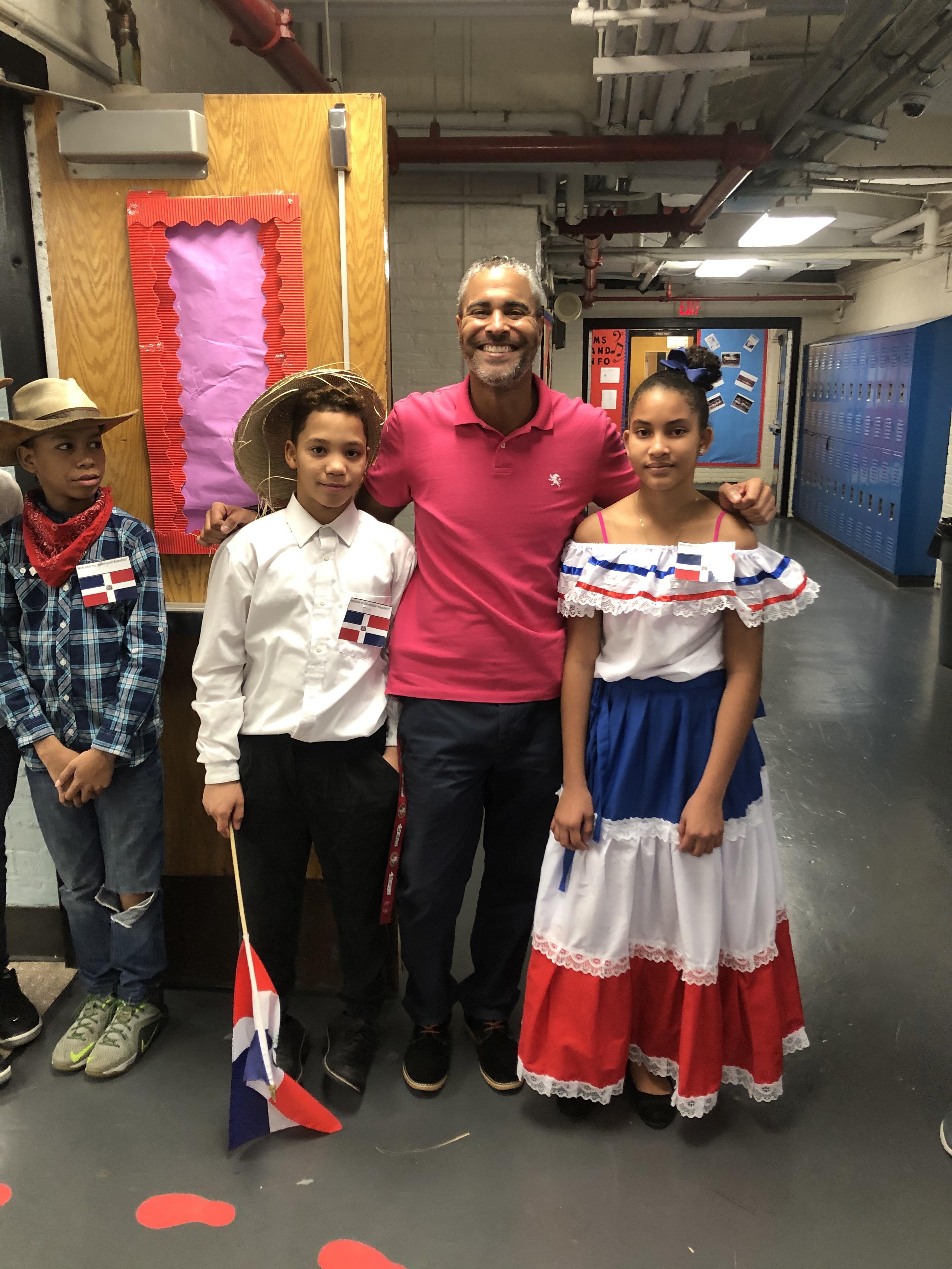Dean Valera with three dominican students